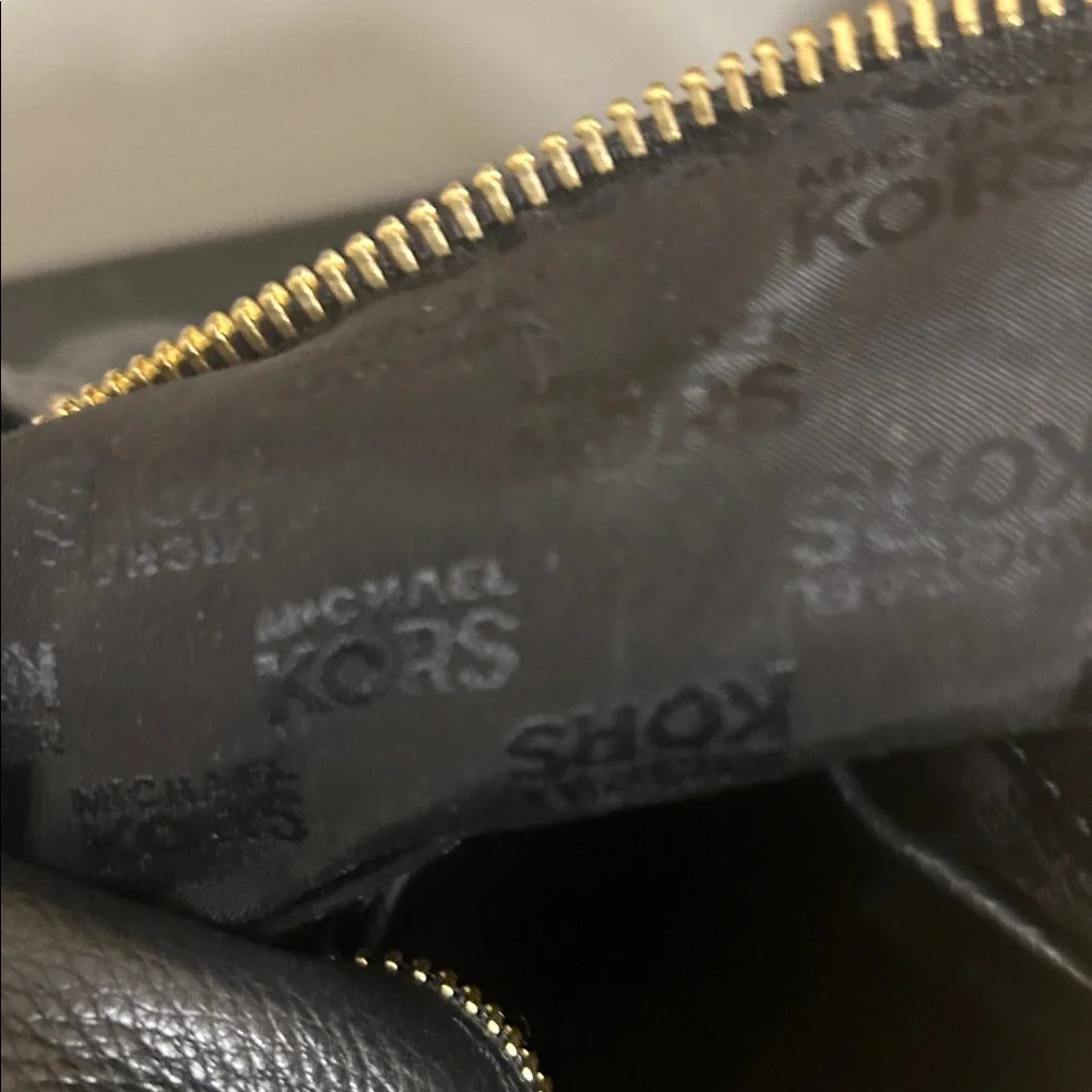 Michael Kors Black Hobo Bag with Gold Accents